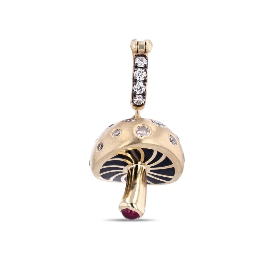 Gold mushroom-shaped pendant with gemstones on a white background