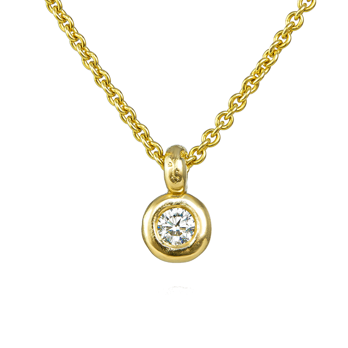 A gold chain necklace with a round bezel-set diamond pendant on a plain white background.