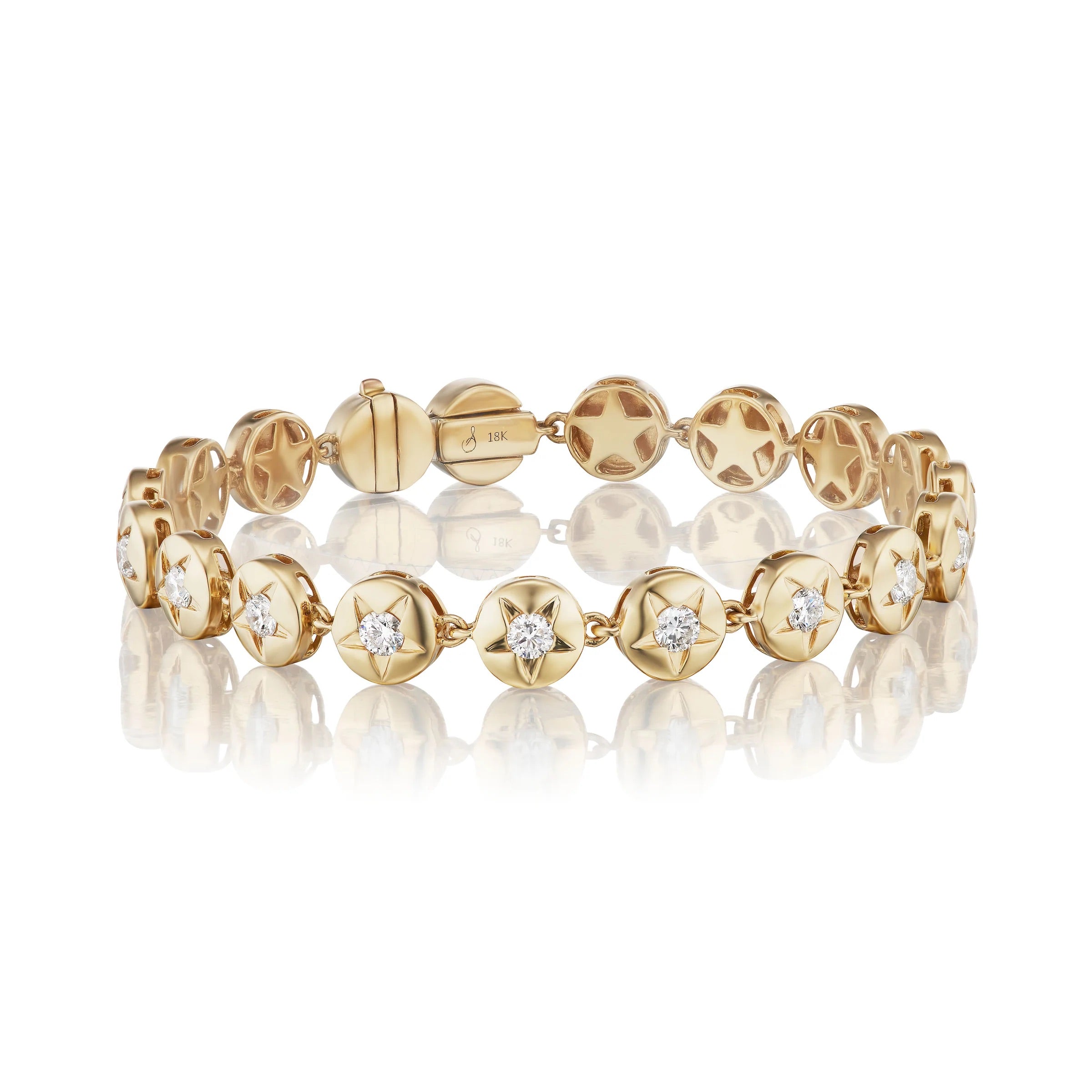 Gold bracelet with diamond accents on a white background