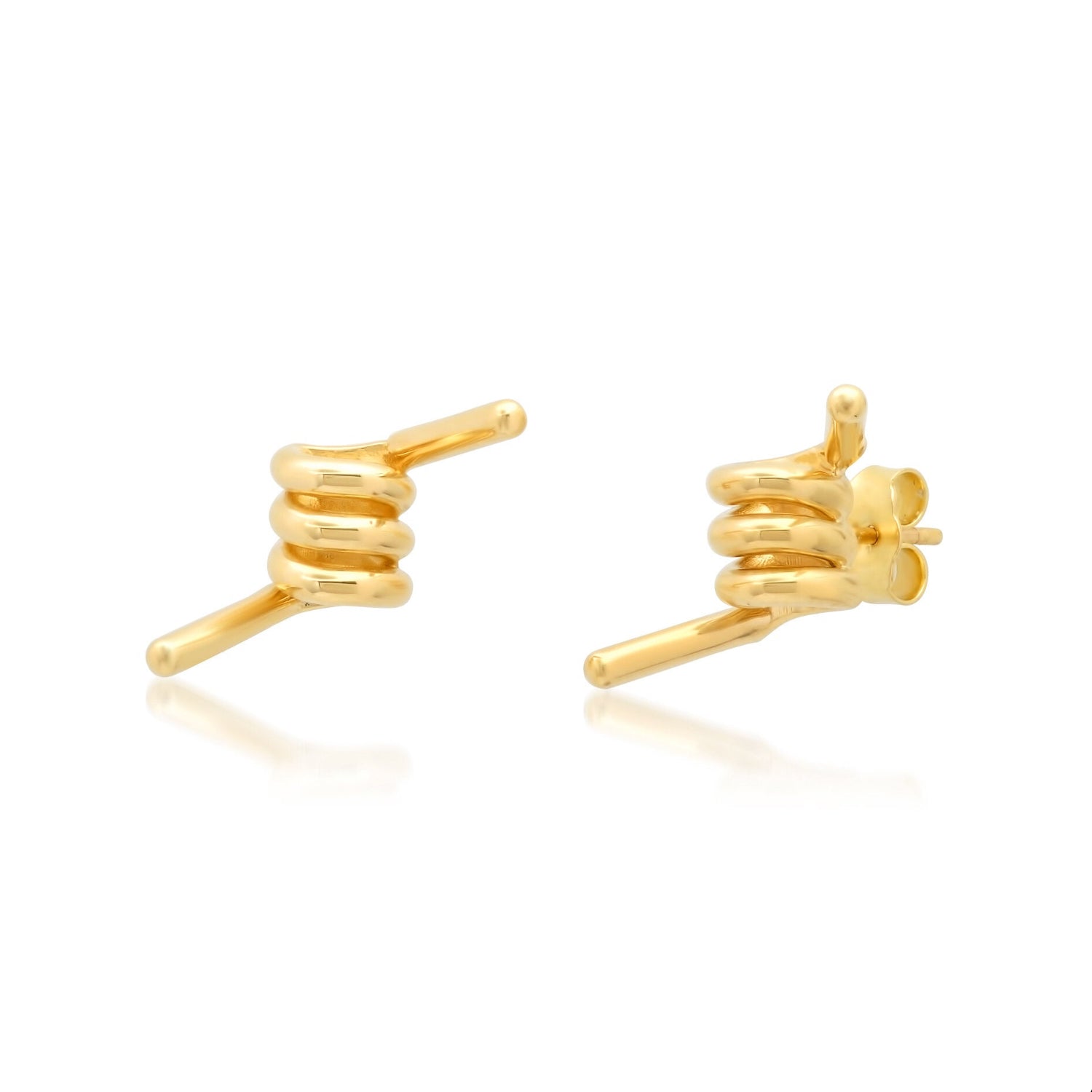 Yellow gold stud on white background
