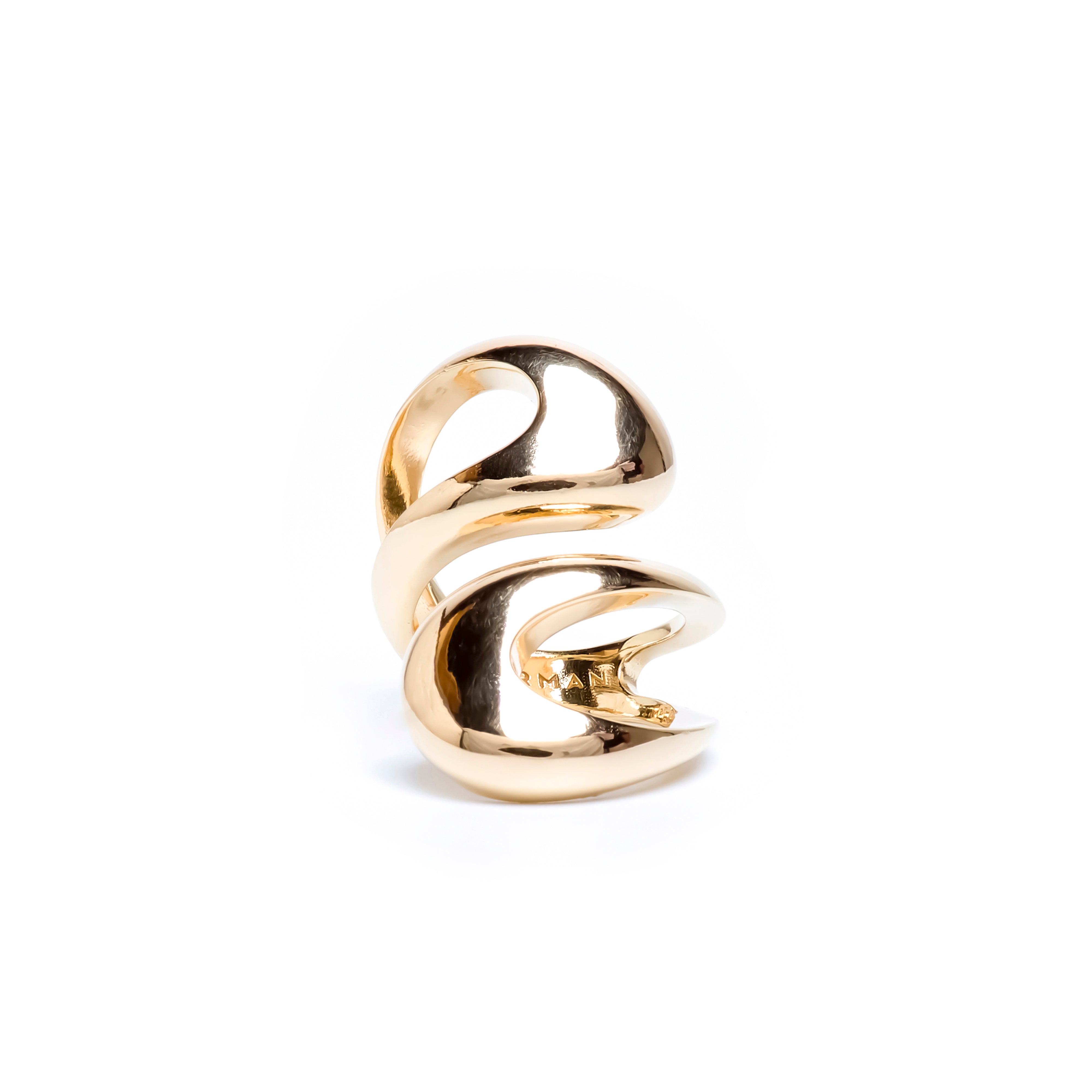 Gold spiral ring on a white background