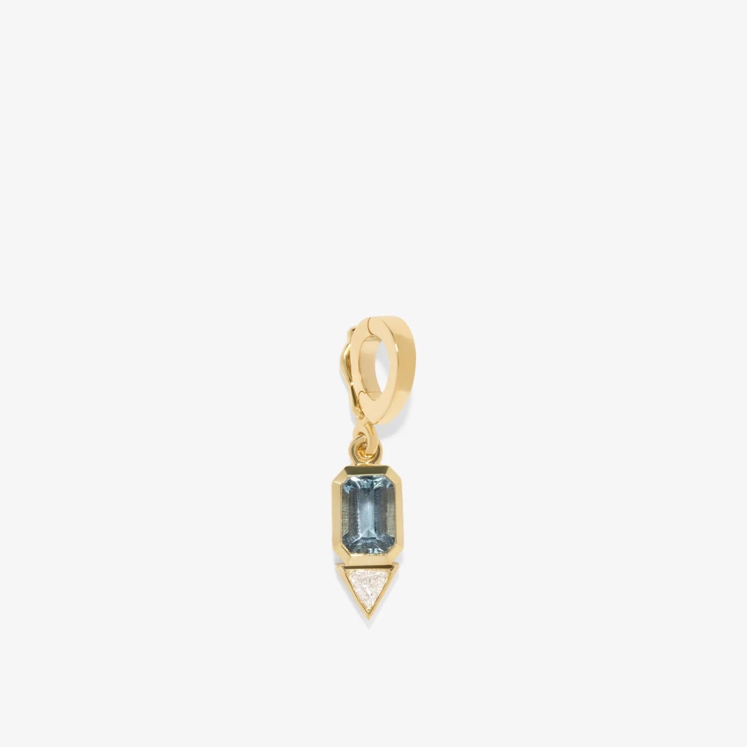 Gold necklace with a heart-shaped pendant featuring a green gemstone on a white background