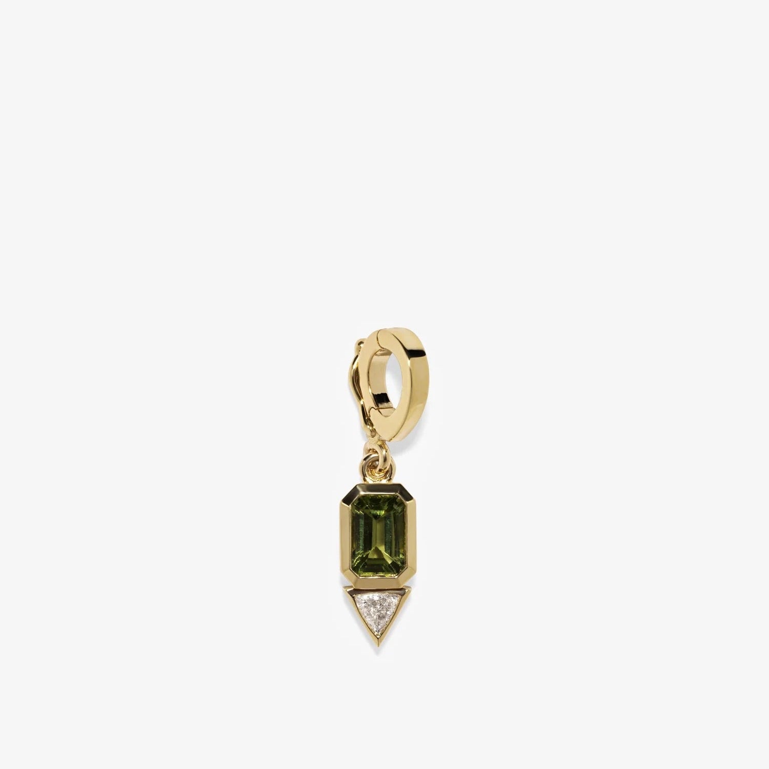 Gold pendant with green gemstone on a white background