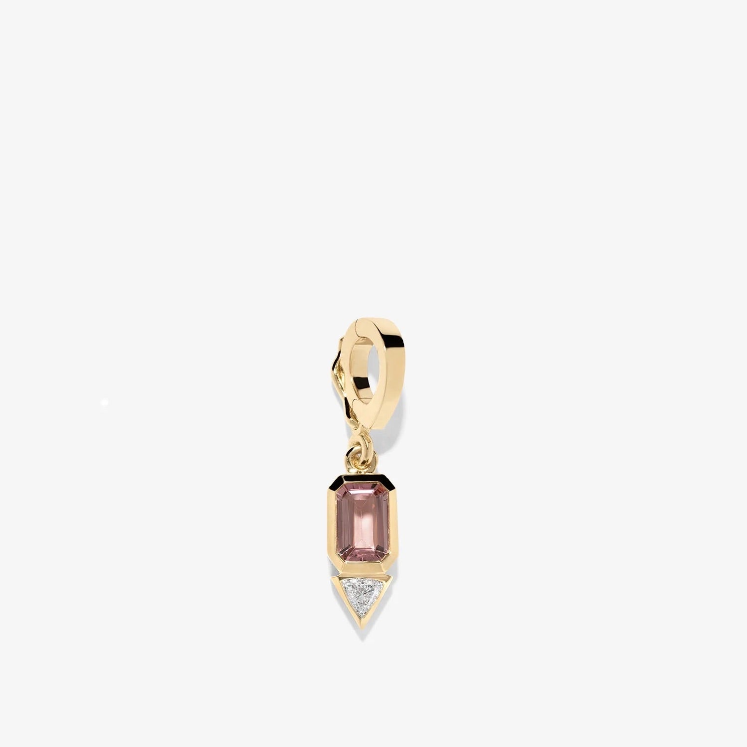 Gold pendant with a pink gemstone on a white background