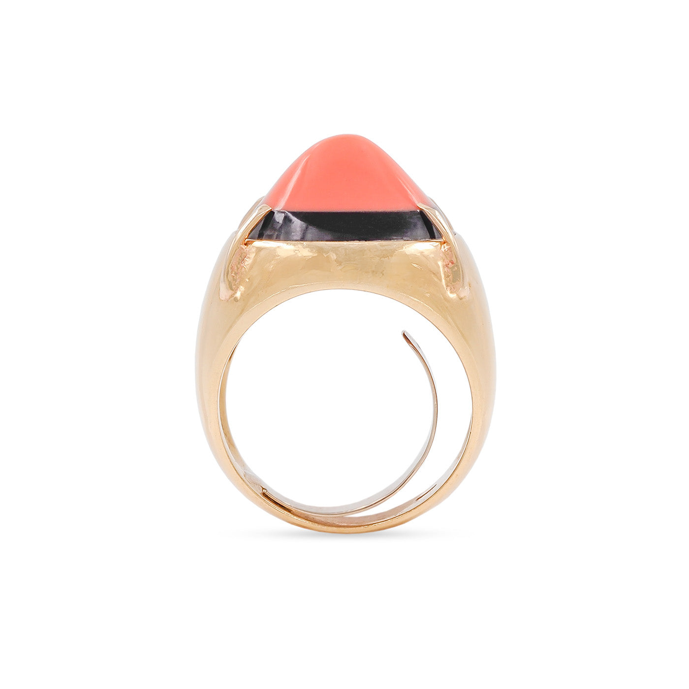 Gold ring with a pink stone on a white background