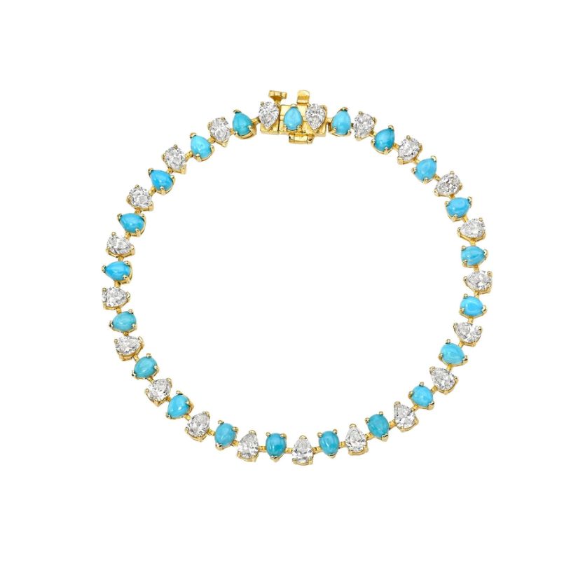 Necklace with turquoise and clear gemstones on a white background