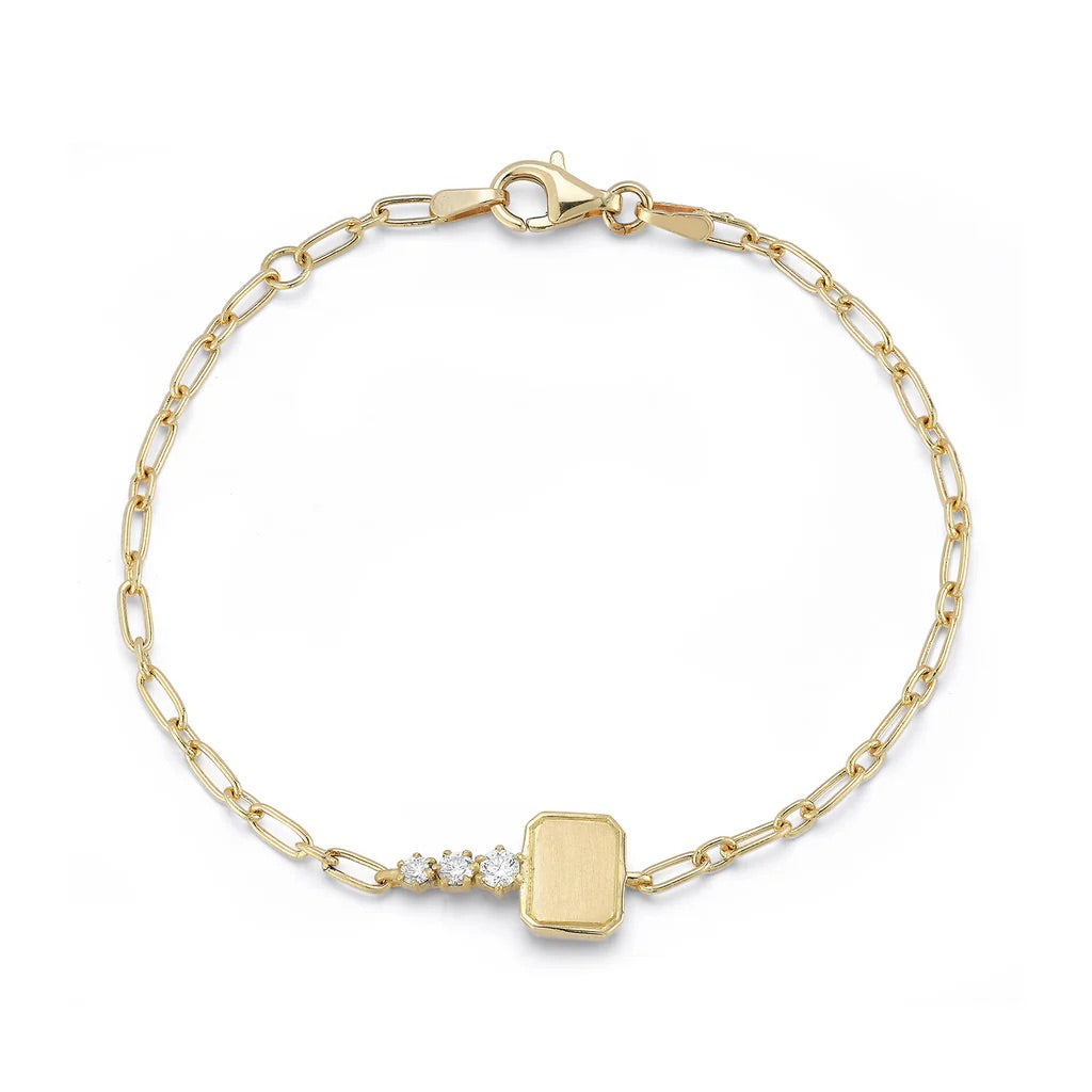 Gold bracelet with a clasp on a white background