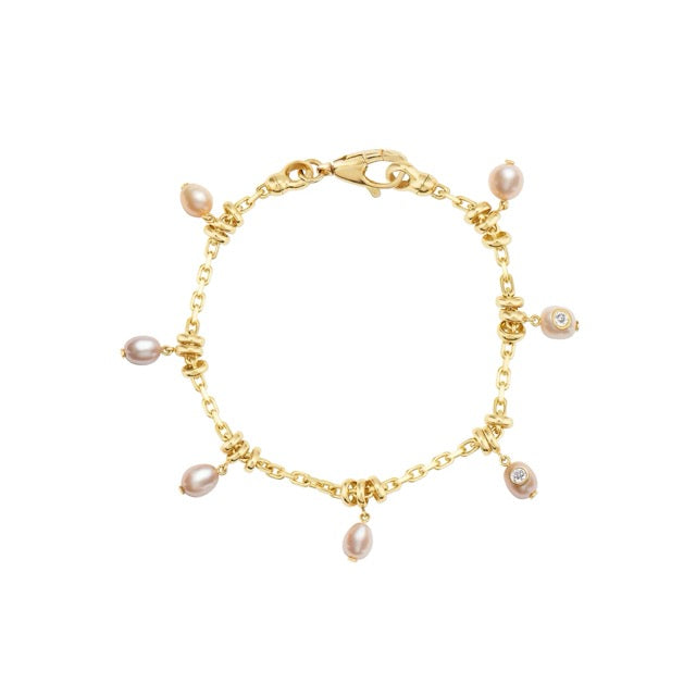 Gold bracelet with pearl charms on a white background