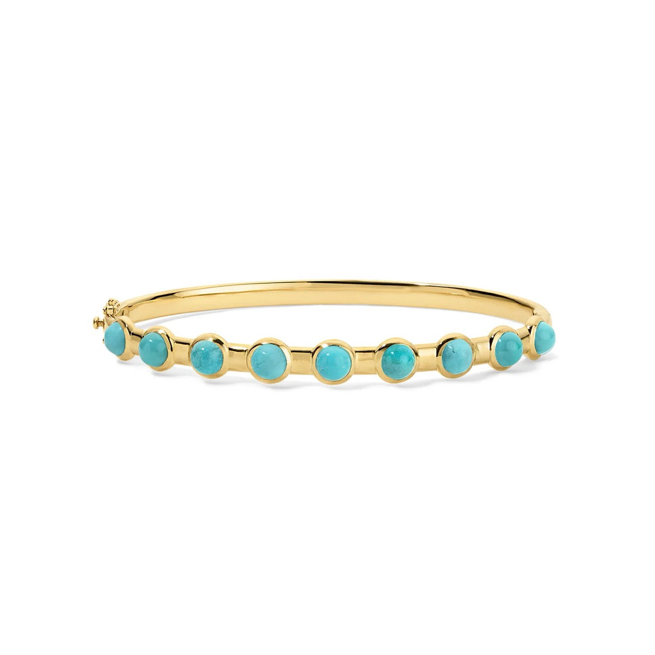 Gold bangle with turquoise stones on a white background