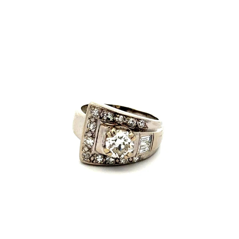 white gold ring with a diamond on a white background