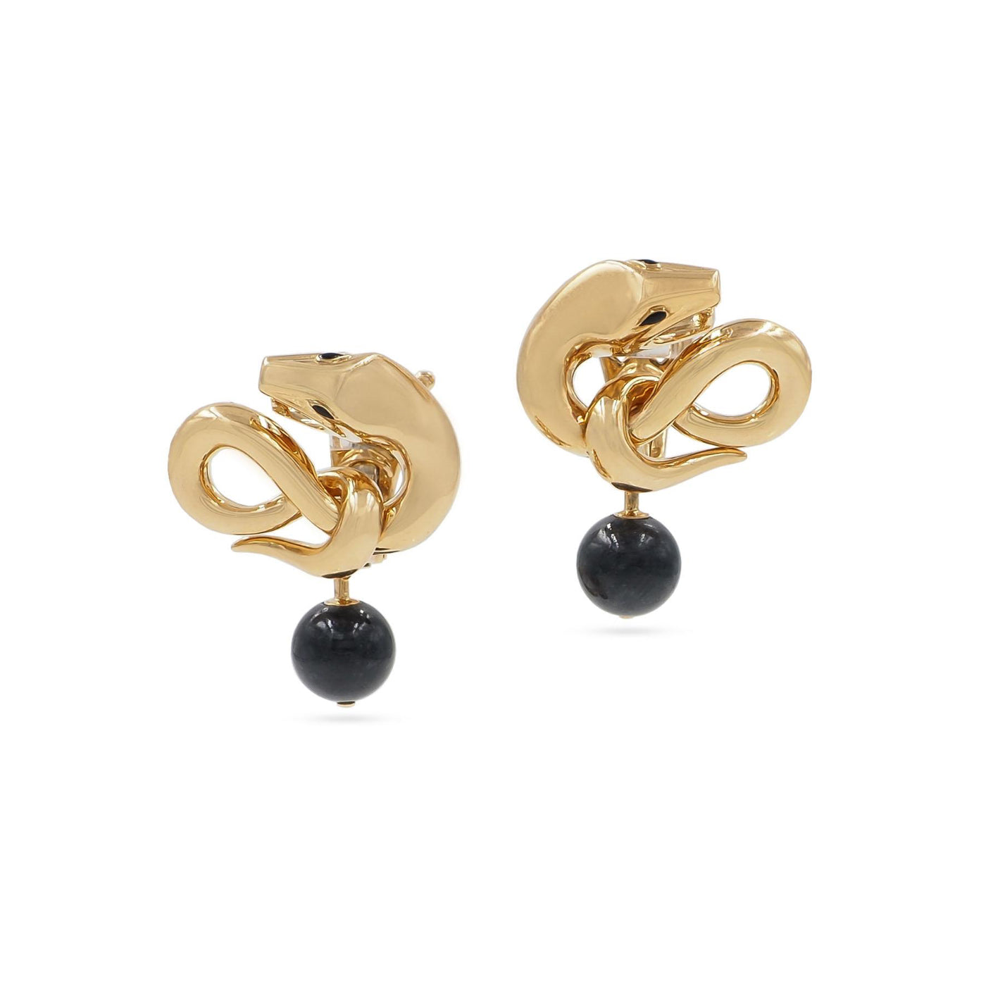 Gold earrings with black beads on a white background