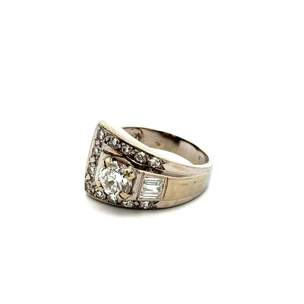 Silver ring with diamond accents on a white background
