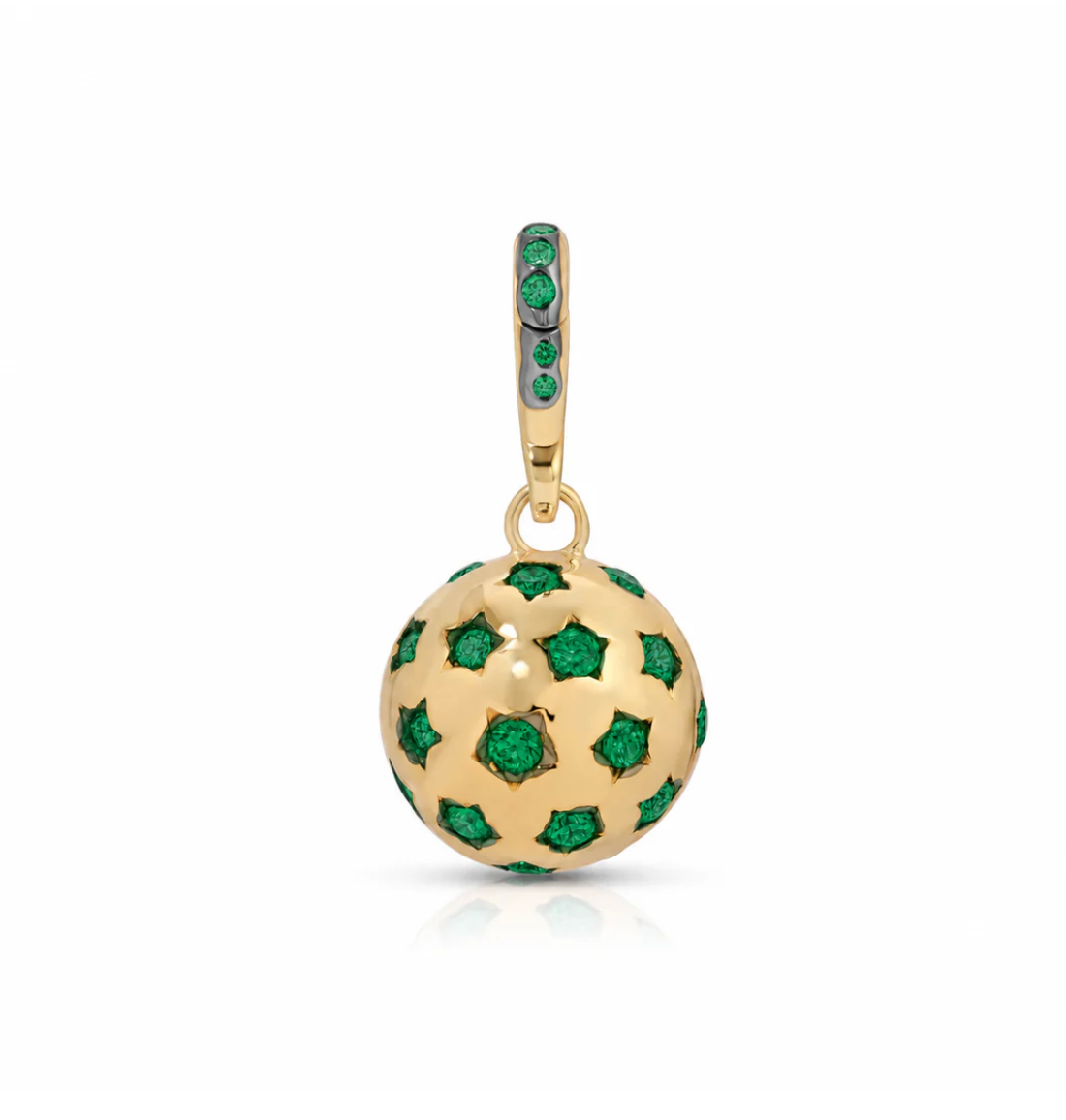 Gold pendant with green gemstones on a white background