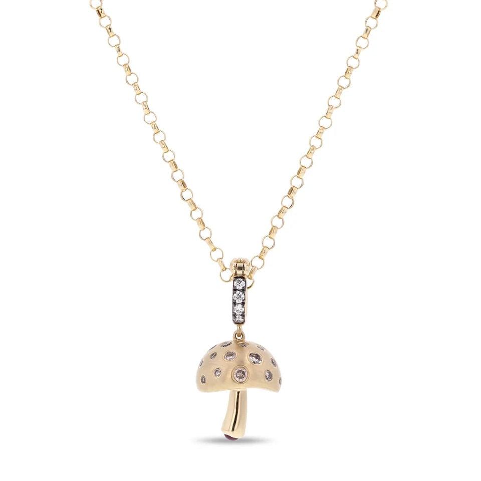 A gold chain necklace with a mushroom-shaped pendant adorned with small clear rhinestones, shown against a plain white background.