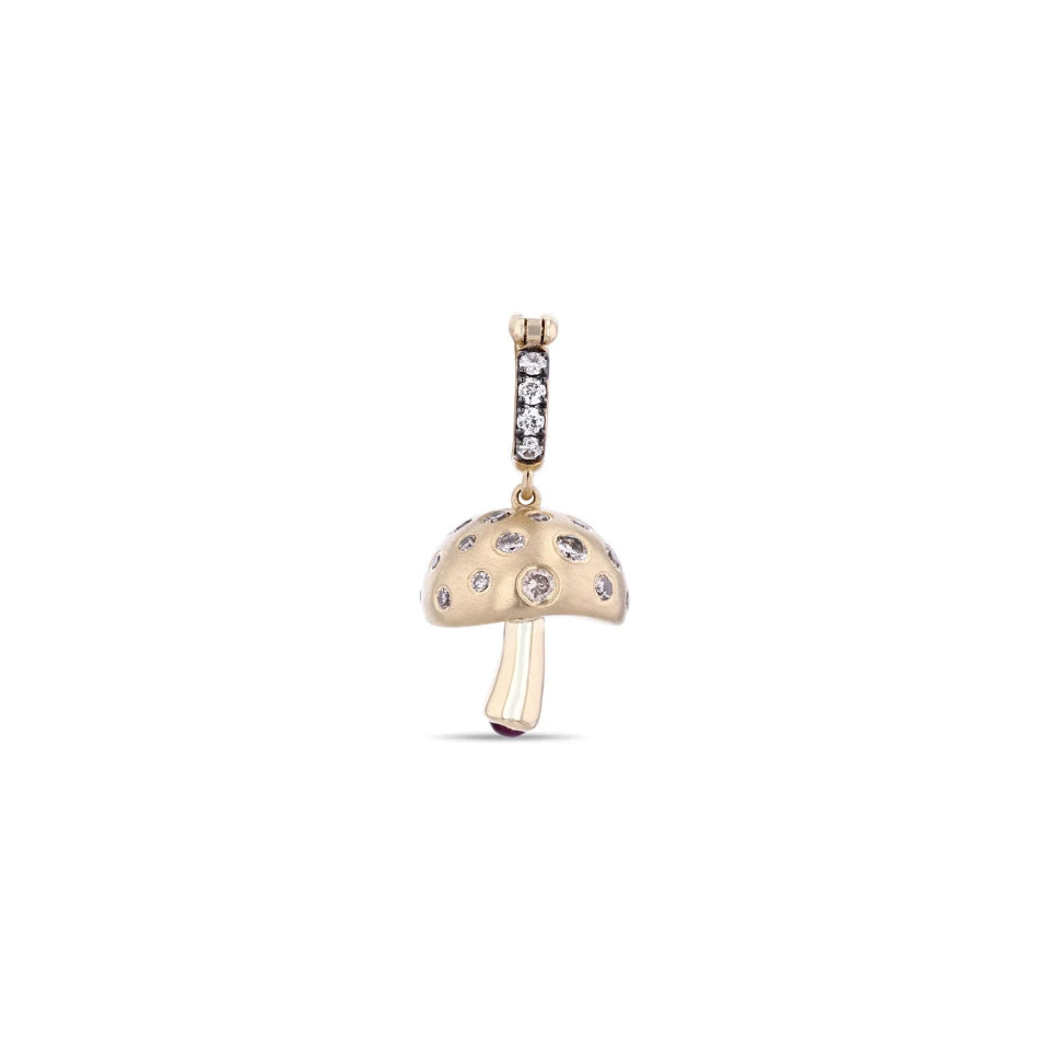 A gold mushroom-shaped pendant charm with clear rhinestones on the cap and a small vertical bar of clear stones above it, shown on a plain white background.