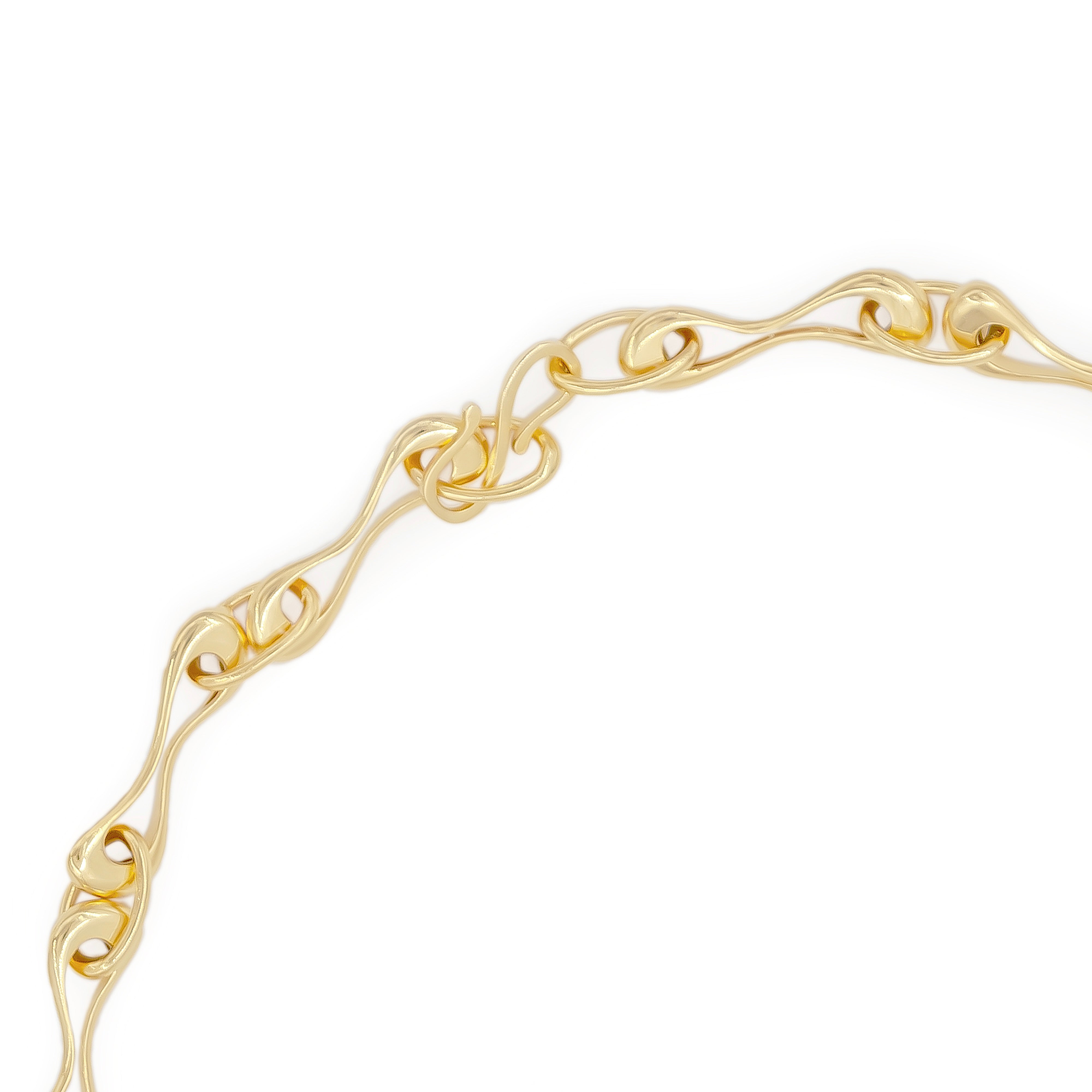 Gold bracelet on a white background