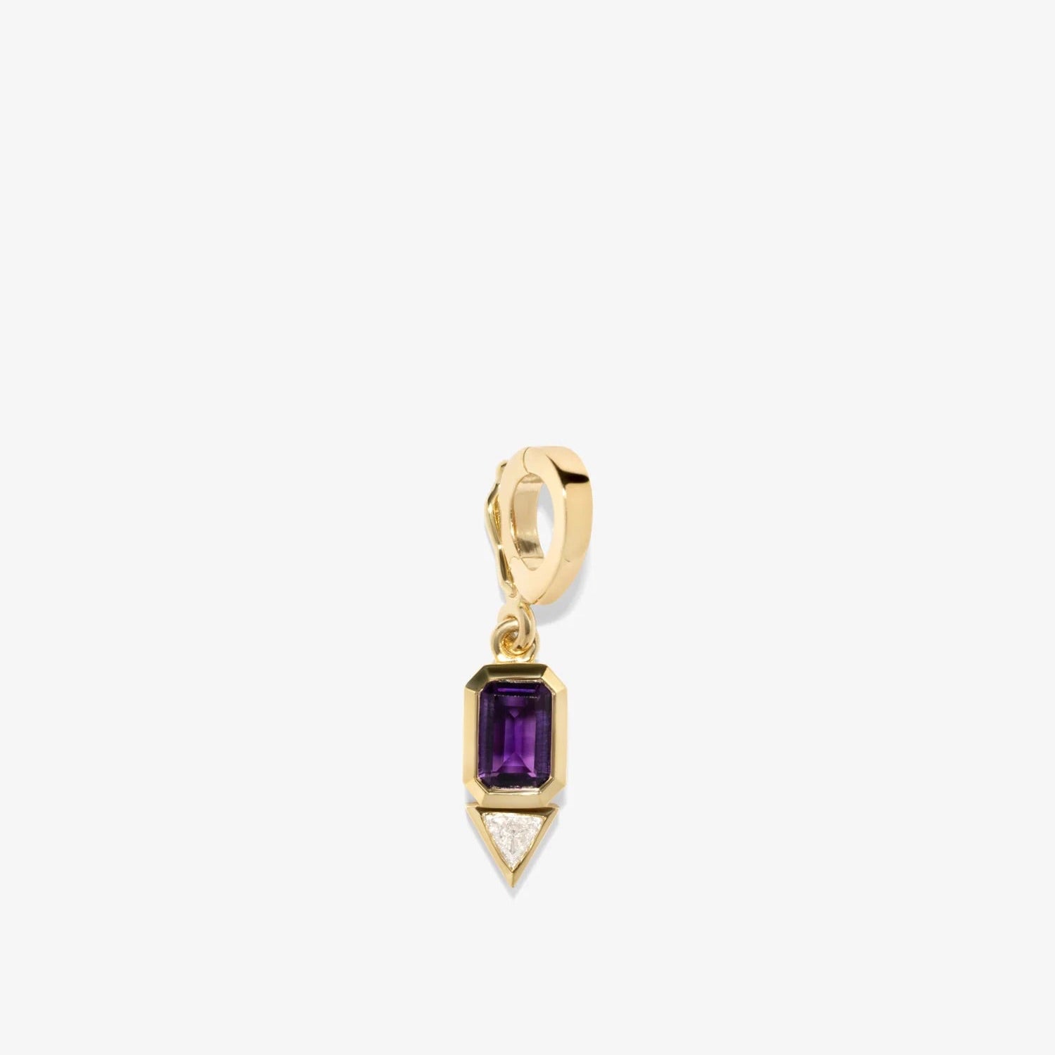 Gold pendant with a purple gemstone on a white background