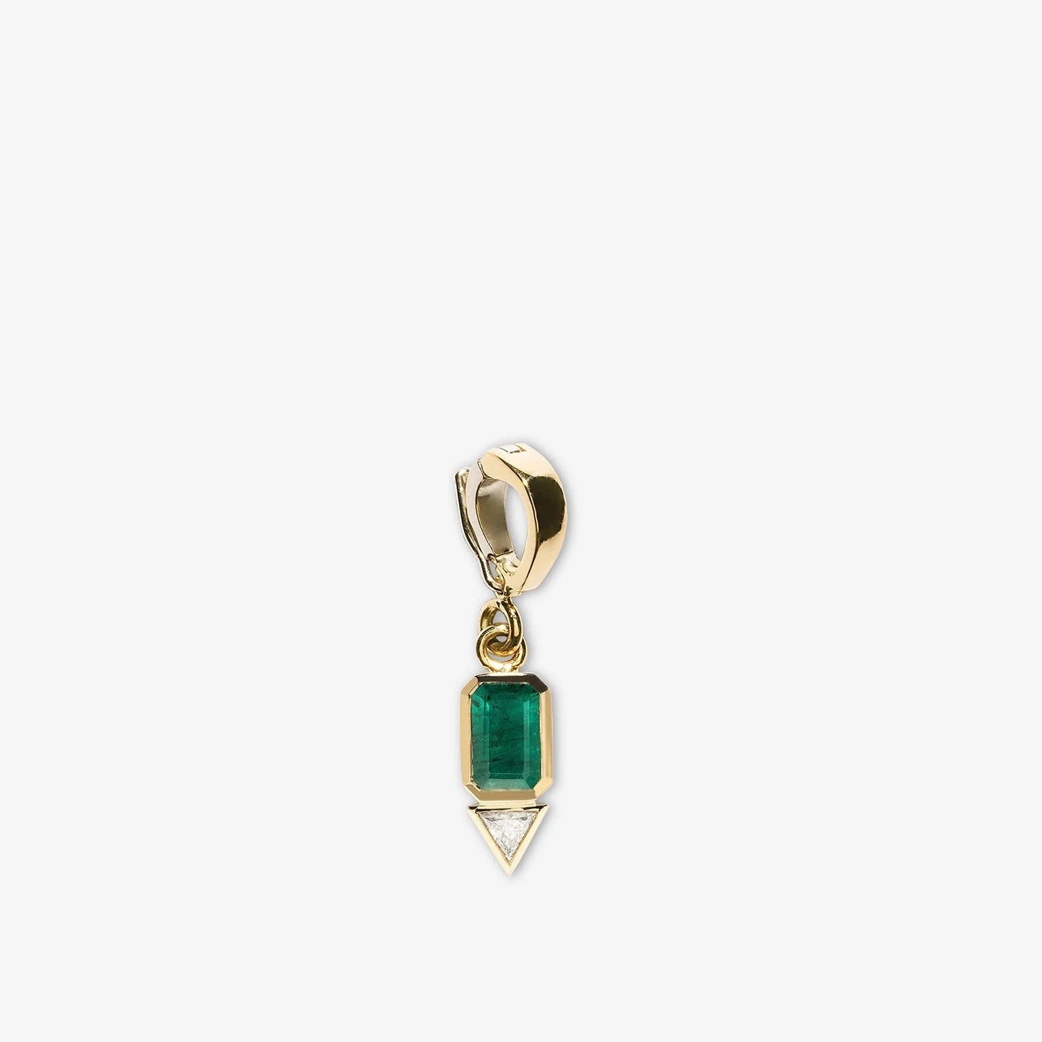 Gold pendant with a green gemstone on a white background