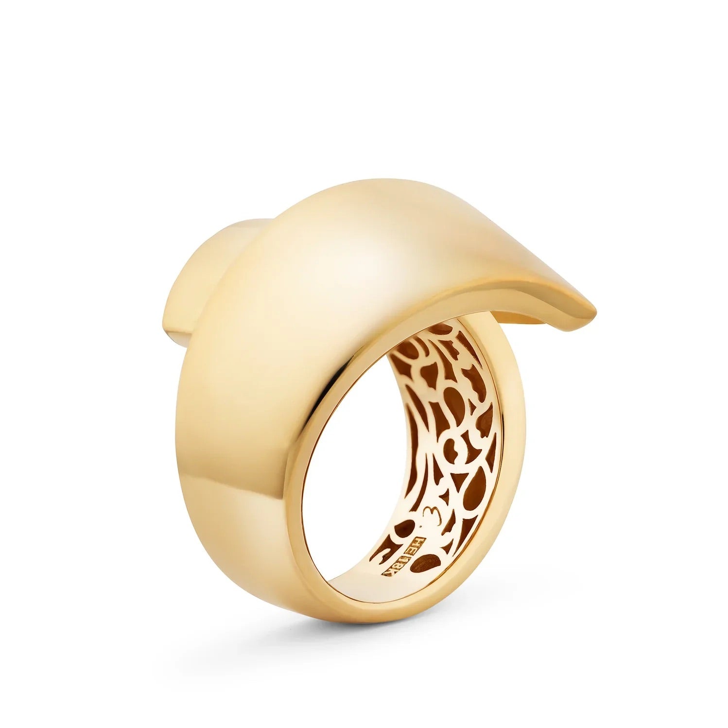 Gold ring with a dolphin design on a white background