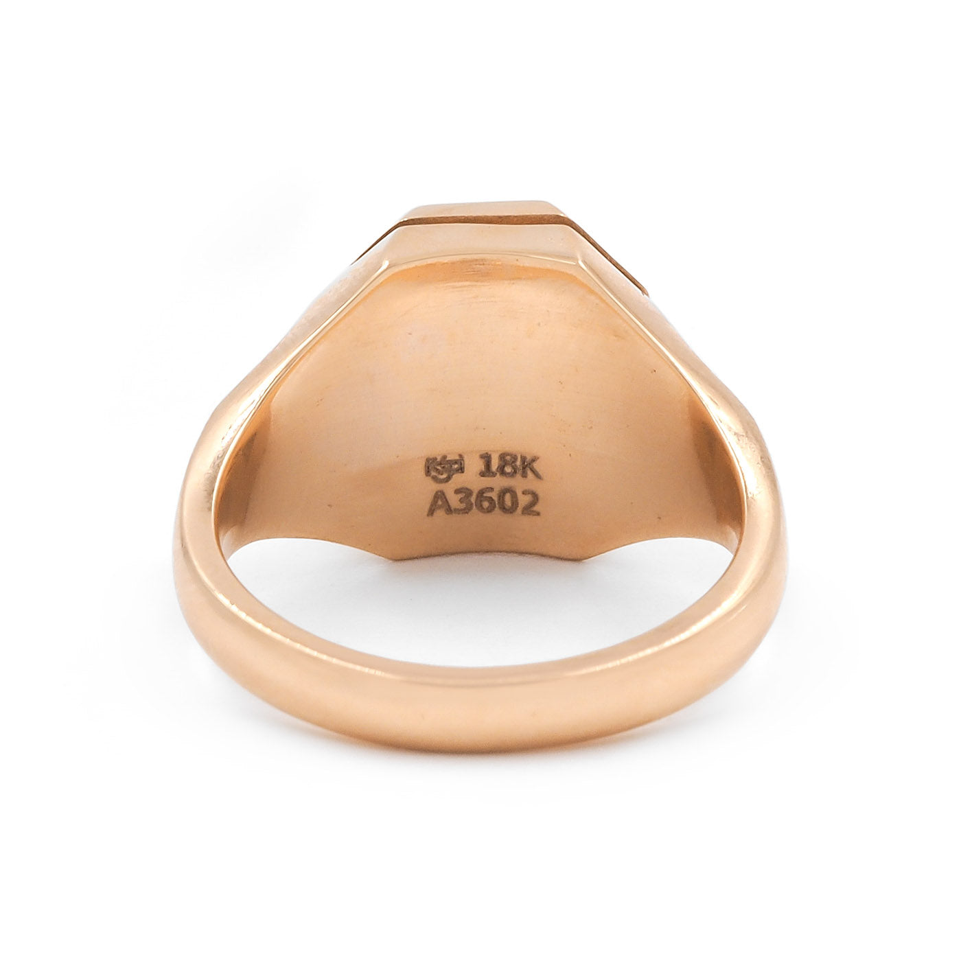 Gold ring on white background