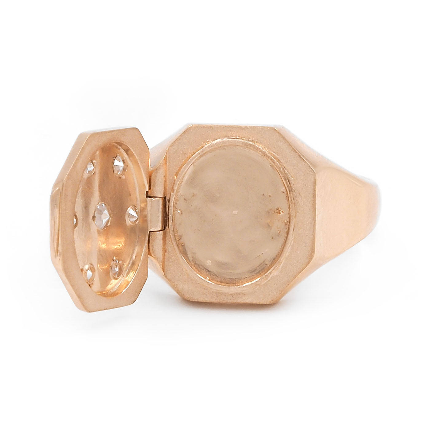 Gold ring on white background
