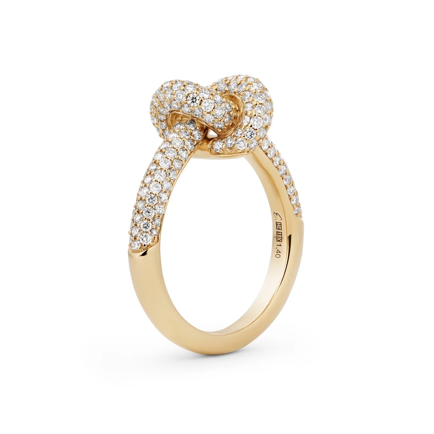 Yellow gold white diamond pave ring on white background