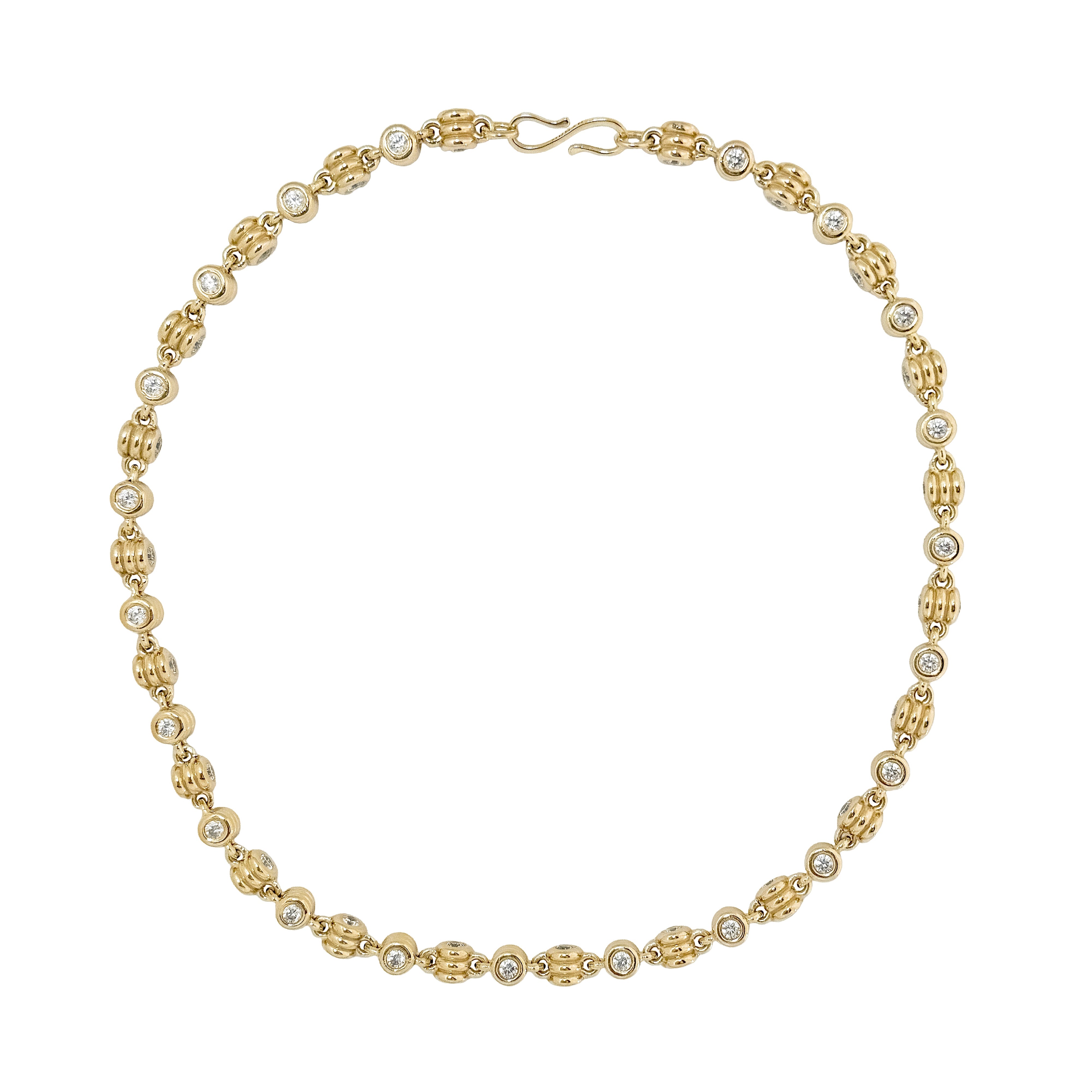 Gold necklace with pearls on a white background
