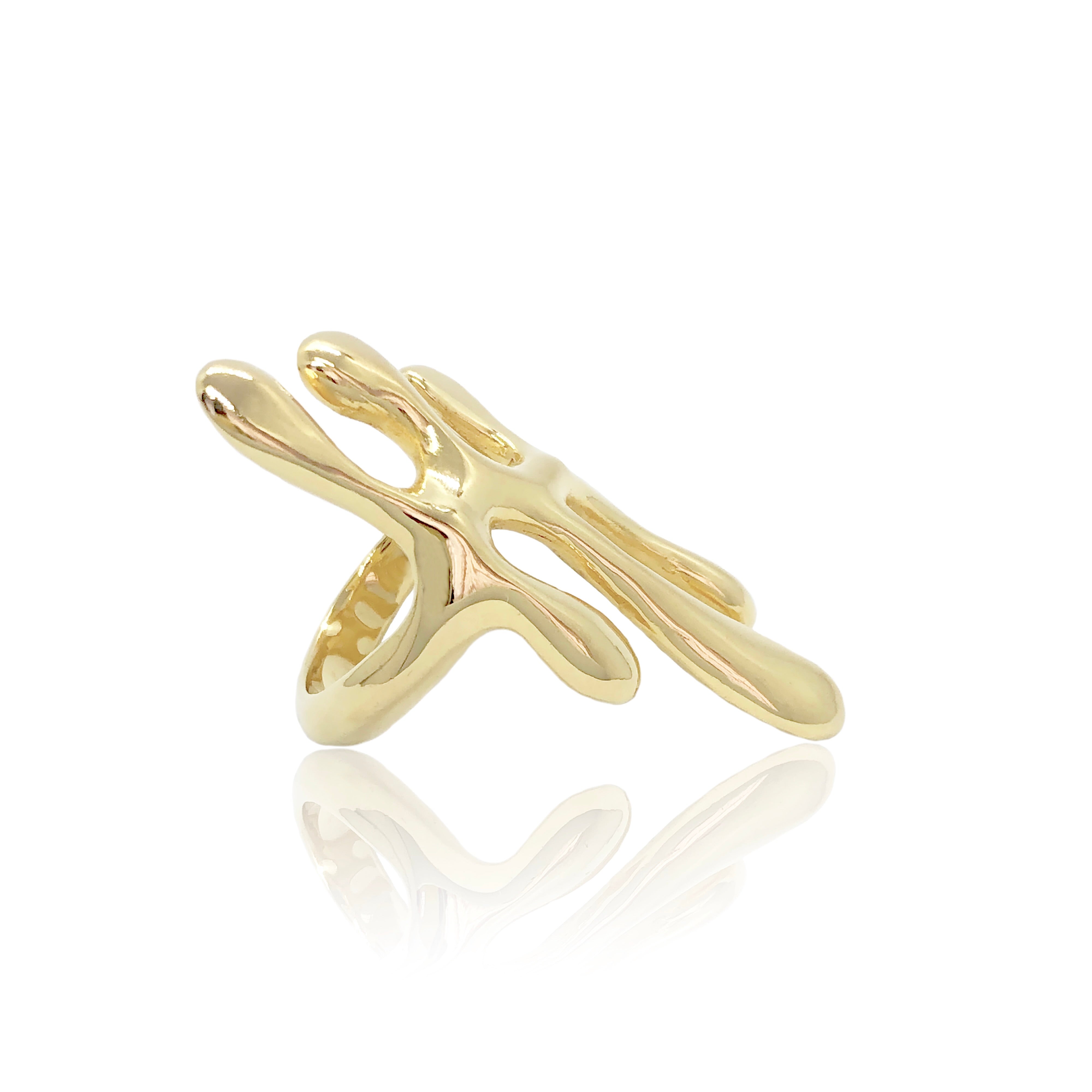 Gold ring with a unique design on a white background