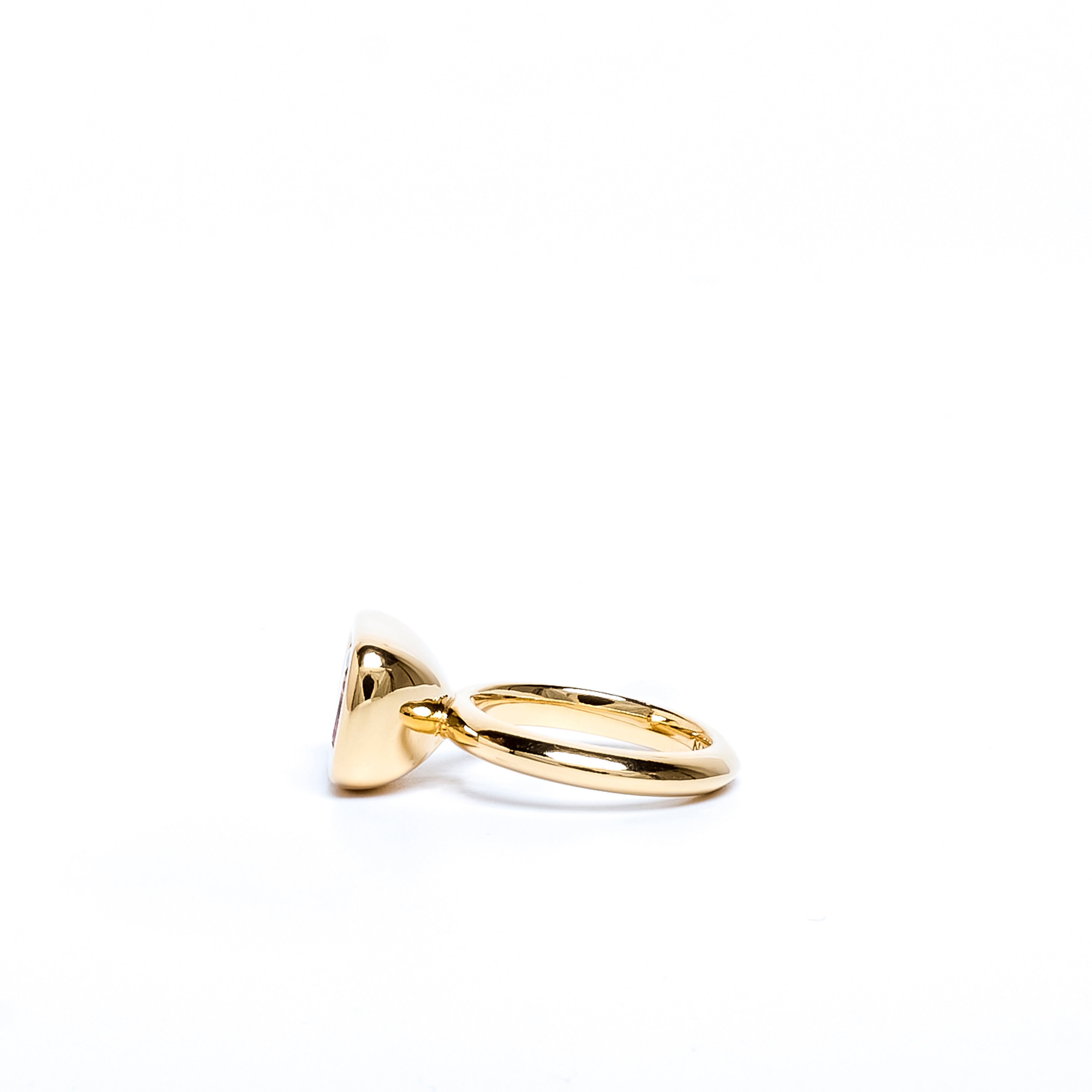 Gold ring on a white background